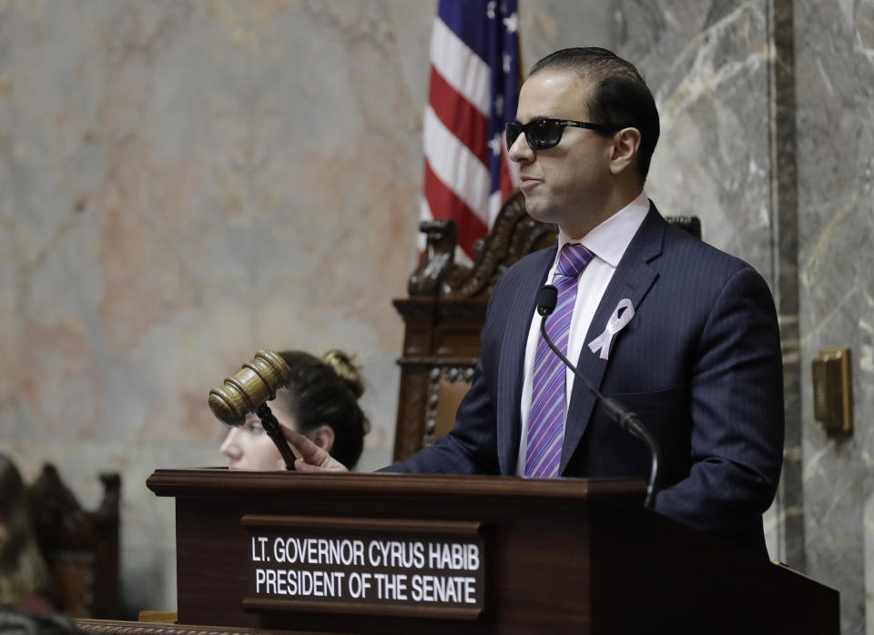 FILE - In this Jan. 30, 2019 file photo, Washington Lt. Gov. Cyrus Habib presides over the Senate at the Capitol in Olympia, Wash. Habib announced on Thursday, March 19, 2020, that he is not running for re-election and will join the Jesuit order of the Catholic Church as he starts the process of becoming a priest. (AP Photo/Ted S. Warren, File)