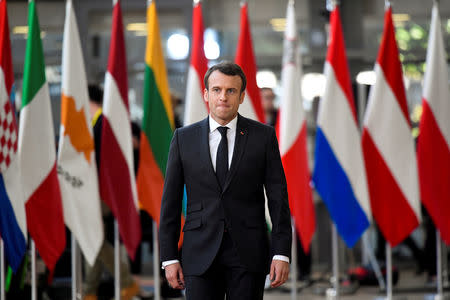 FILE PHOTO: French President Emmanuel Macron arrives for a European Union leaders summit in Brussels, Belgium March 21, 2019. REUTERS/Toby Melville/File Photo