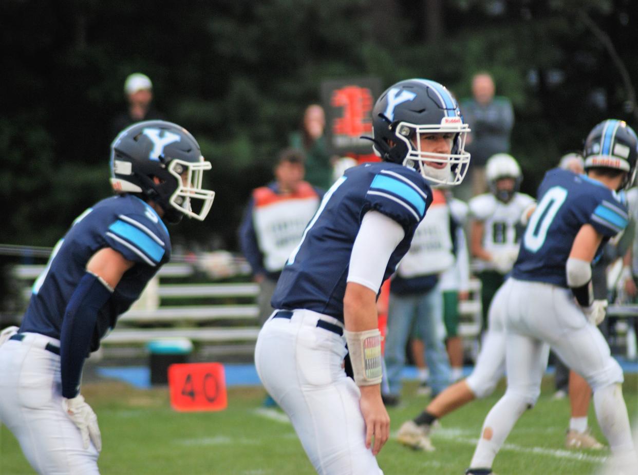 York quarterback Peter Martin prepares for the snap during the Wildcats' 63-13 loss to Leavitt on Friday night, with Brody Gullison lined up in the backfield.