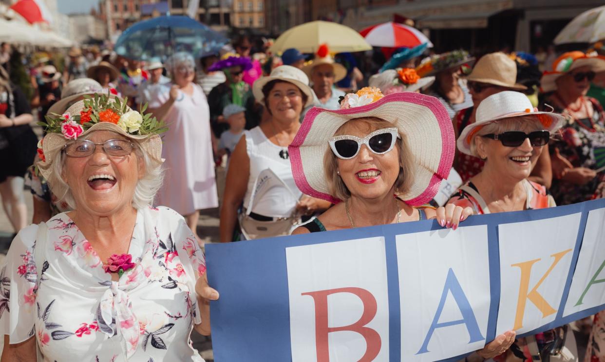 <span>‘The most feared group of people in Europe’ … the march of hats in Wrocław, Poland.</span><span>Photograph: Róbert Németi/The Guardian</span>