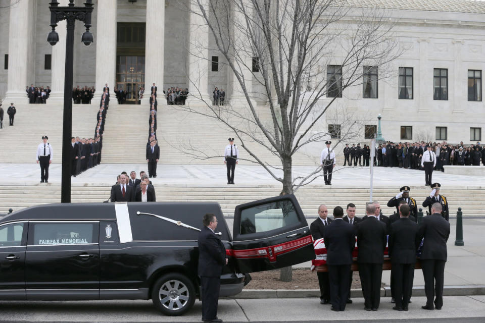 Hearse arrives with casket 