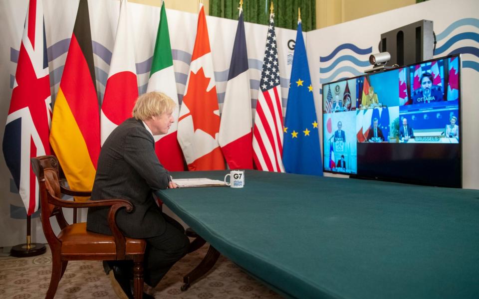 Boris Johnson hosting a virtual meeting of G7 leaders in the Cabinet Room - Geoff Pugh 