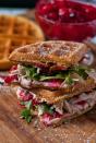 <p>Stop everything: We found the perfect mix of sweet and savory, and it's these waffle sandwiches.</p><p><strong>Get the recipe at <a href="http://neighborfoodblog.com/2013/12/waffled-cranberry-cream-cheese-turkey-sandwiches-sundaysupper.html" rel="nofollow noopener" target="_blank" data-ylk="slk:NeighborFood;elm:context_link;itc:0;sec:content-canvas" class="link ">NeighborFood</a>. </strong> </p>