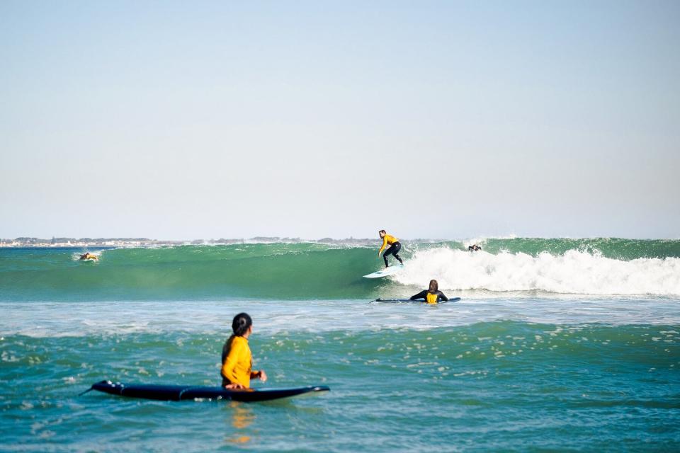 Surfing at Muizenberg with Stoked Surf School