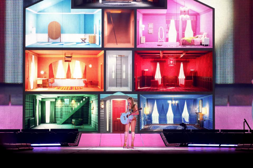 Taylor Swift performs in front of the Lover House during the Eras Tour.