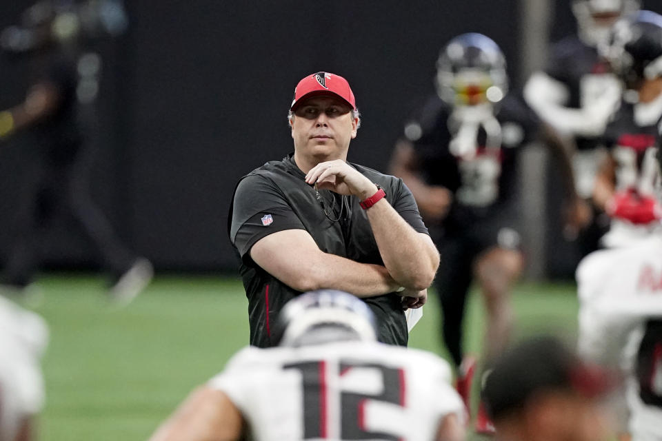 Atlanta Falcons head coach Arthur Smith watches during a voluntary offseason NFL football practice Friday, June 3, 2022, in Atlanta. (AP Photo/John Bazemore)