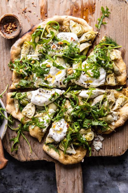 <p>Half Baked Harvest</p><p>Artichoke pesto and burrata pizza with lemony arugula…for those nights when you’re looking for a really good pizza, but you also need a salad.</p><p><strong>Get the recipe: <a href="https://www.halfbakedharvest.com/artichoke-pesto-and-burrata-pizza-with-lemony-arugula/" rel="nofollow noopener" target="_blank" data-ylk="slk:Artichoke Pesto and Burrata Pizza and Lemony Arugula;elm:context_link;itc:0;sec:content-canvas" class="link rapid-noclick-resp"><em>Artichoke Pesto and Burrata Pizza and Lemony Arugula</em></a></strong></p>