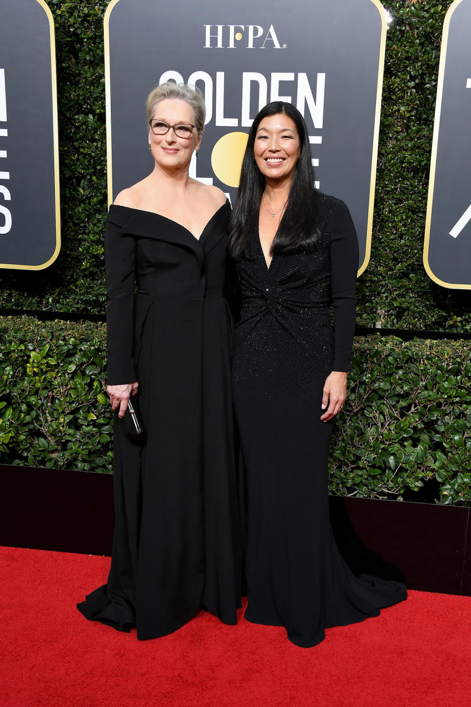 Actor Meryl Streep (L) and activist Ai-jen Poo attend The 75th Annual Golden Globe Awards at The Beverly Hilton Hotel on January 7, 2018 in Beverly Hills, California. (Photo by Steve Granitz/WireImage)