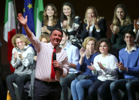 Italian Prime Minister Matteo Renzi waves as he talks during a meeting in support of the 'Yes' vote in the upcoming constitutional reform referendum in Rome, Italy November 26, 2016. REUTERS/Alessandro Bianchi