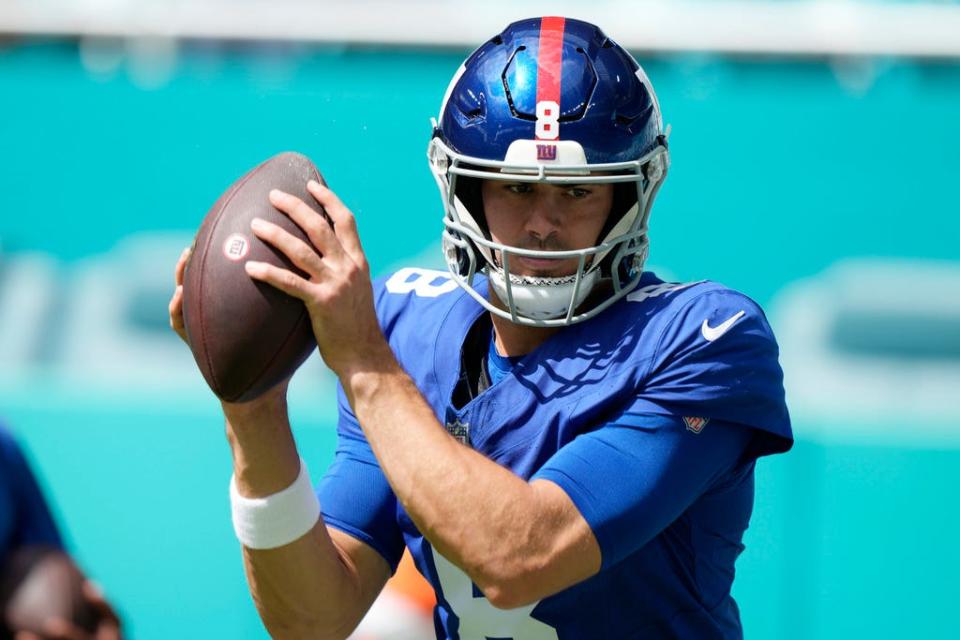 New York Giants quarterback Daniel Jones (8) warms up before an NFL football game against the Miami Dolphins, Sunday, Oct. 8, 2023, in Miami Gardens Fla. (AP Photo/Wilfredo Lee)