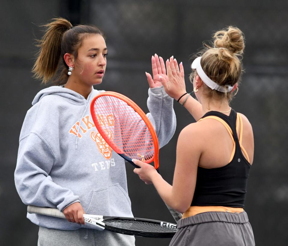Hoover doubles team Ema Papcke and Addie Sheil compete against Jackson's Anisha Rawa and Isha Nagajothi in the Division I sectional semifinals at Jackson Park Courts, Saturday, Oct. 7, 2023.