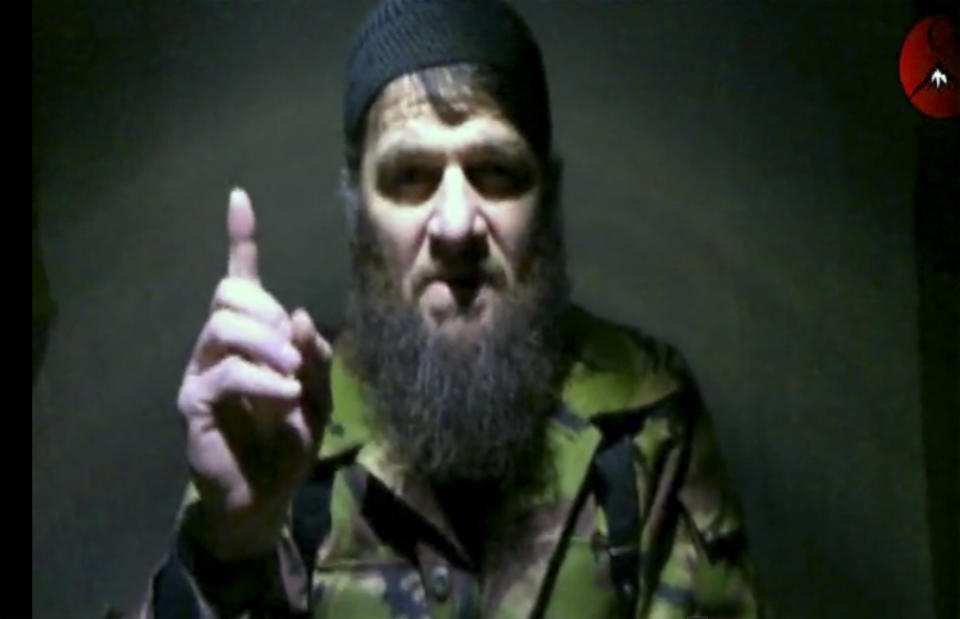 FILE - This is a file image taken from video and released Monday, Feb. 7, 2011 by The Kavkaz Center, a website affiliated with Chechen rebels, of insurgent leader Doku Umarov speaking in a video. An Islamic militant group in Russia's North Caucasus is reporting the death of Doku Umarov its leader, who had threatened to attack Sochi Olympics and was one of Russia's most wanted men. The Caucasus Emirate announced the "martyrdom" of Umarov in a statement posted Tuesday on the website of Kavkaz Center, which serves as a mouthpiece for Islamic militant groups. No cause was given. (AP Photo/The Kavkaz Center, File) NO SALES