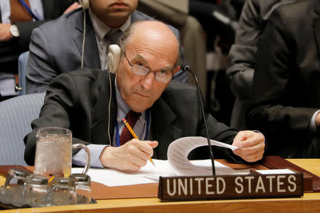 FILE PHOTO: United States diplomat Elliott Abrams takes notes during a meeting of the U.N. Security Council called to vote on a U.S. draft resolution calling for free and fair presidential elections in Venezuela at U.N. headquarters in New York, U.S., February 28, 2019. REUTERS/Lucas Jackson