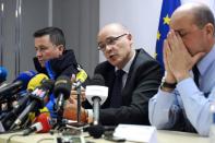 Lead prosecutor Brice Robin (C), flanked by General David Galtier (R), speaks at a press on March 26, 2015 in Marignane airport near the French southern city of Marseille