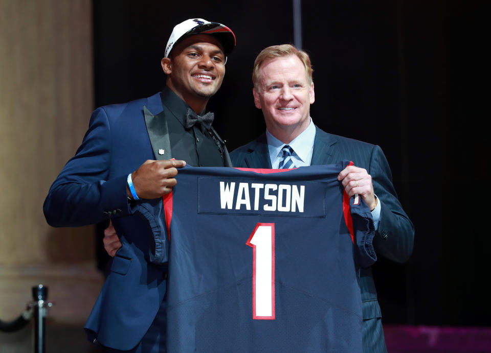 Deshaun Watson, left, poses with NFL commissioner Roger Goodell after being drafted by the Texans. (AP)