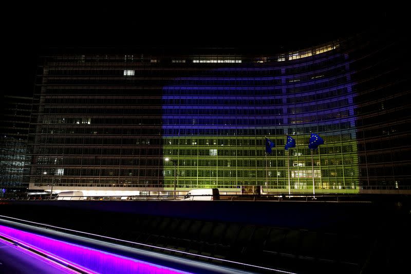 FILE PHOTO: European Commission is illuminated in Ukrainian colours, in Brussels