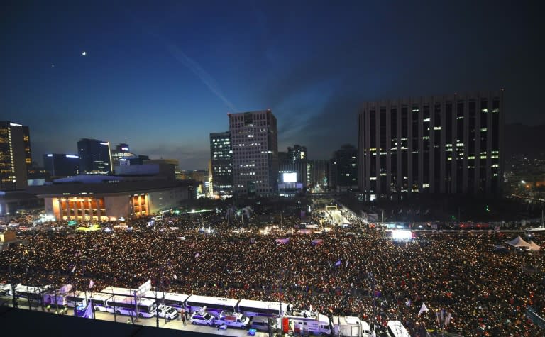 Protesters rally against South Korea's President Park Geun-Hye during a demonstration in Seoul, on December 3, 2016