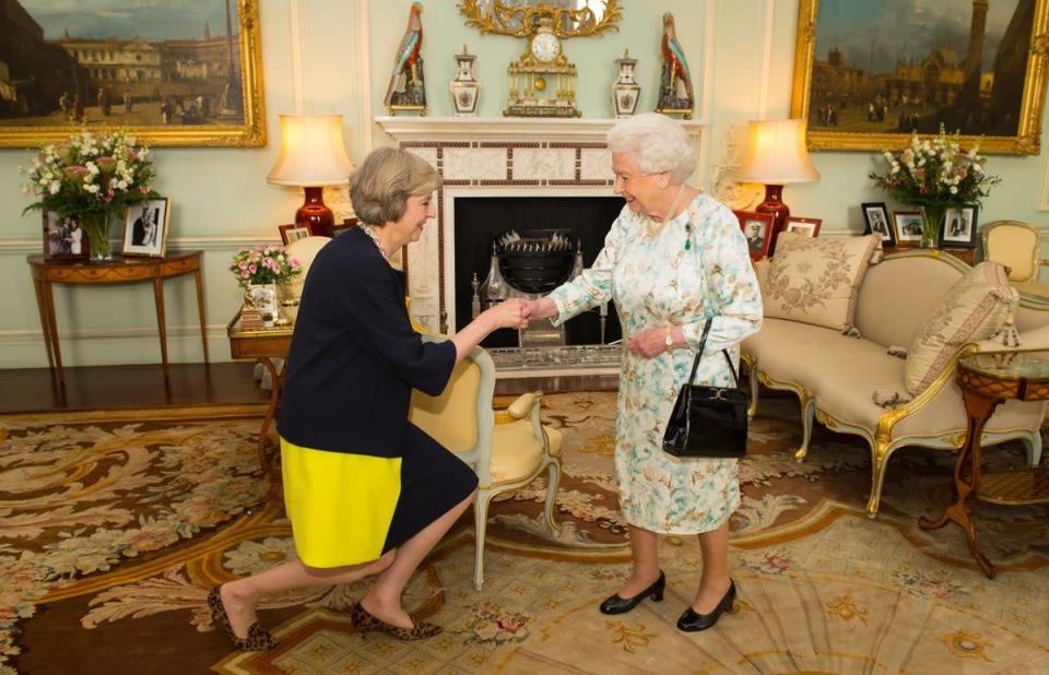 The Queen welcoming Theresa May as she invited the former home aecretary to become prime minister and form a government in 2016 (Dominic Lipinski/PA) (PA Wire)