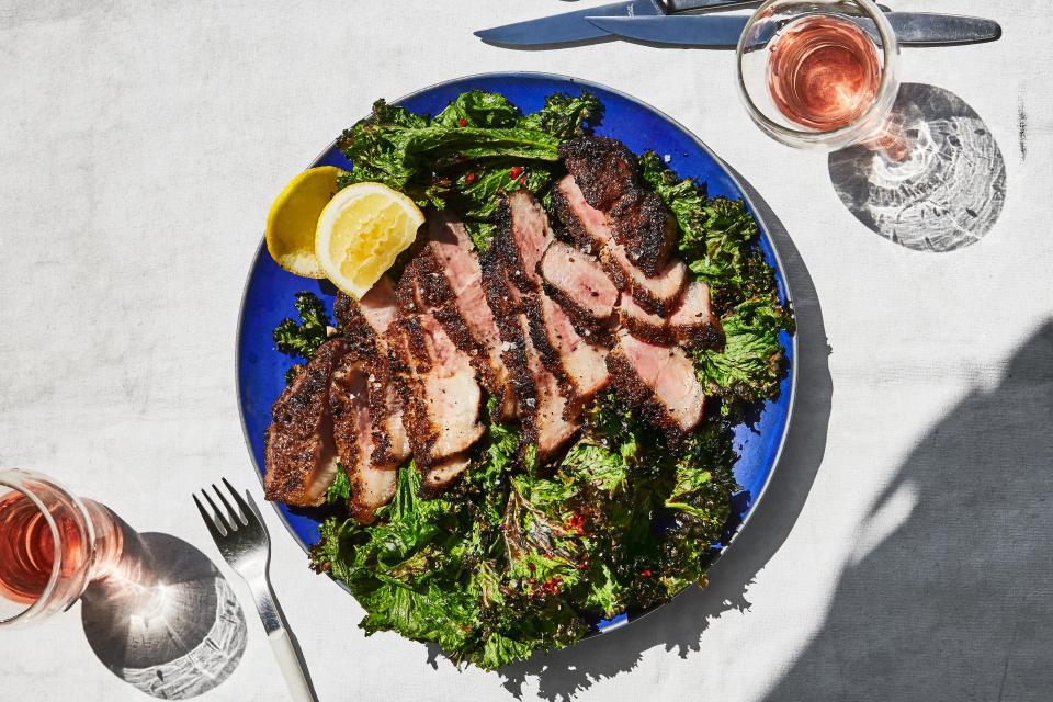 Pork Shoulder Steaks with Grilled Mustard Greens