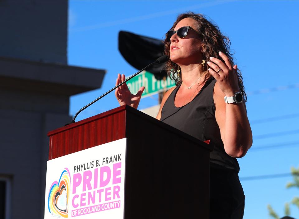 Rockland Pride Center's executive director Brooke Malloy offers remarks at the Bayard Rustin Way dedication ceremony at The Rockland Pride Center in Nyack on Thursday, June 9, 2022.