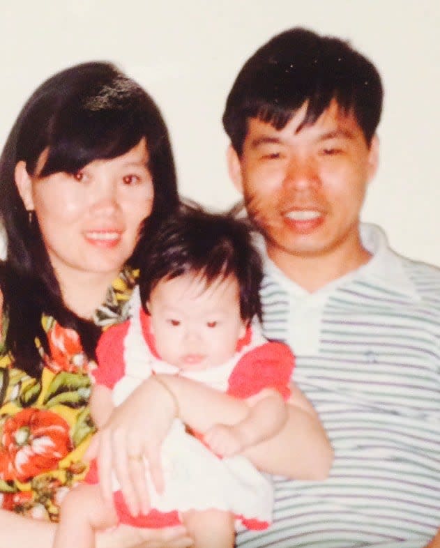 Venessa Liang's parents Muling Liu, left, and Ben Liang pose with Vanessa when she was a baby.