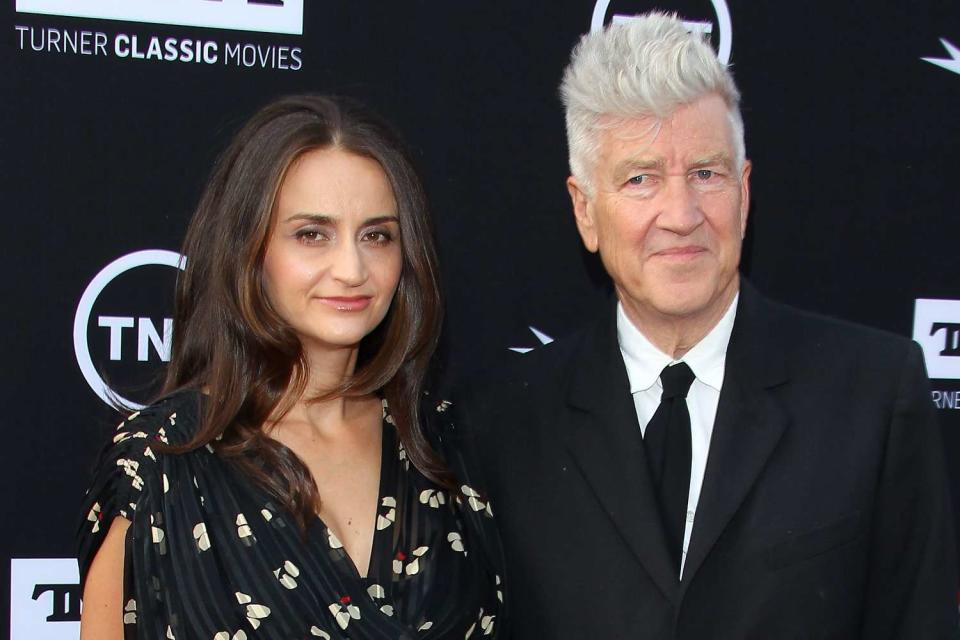 <p>JB Lacroix/WireImage</p> David Lynch and Emily Stofle ttend AFI