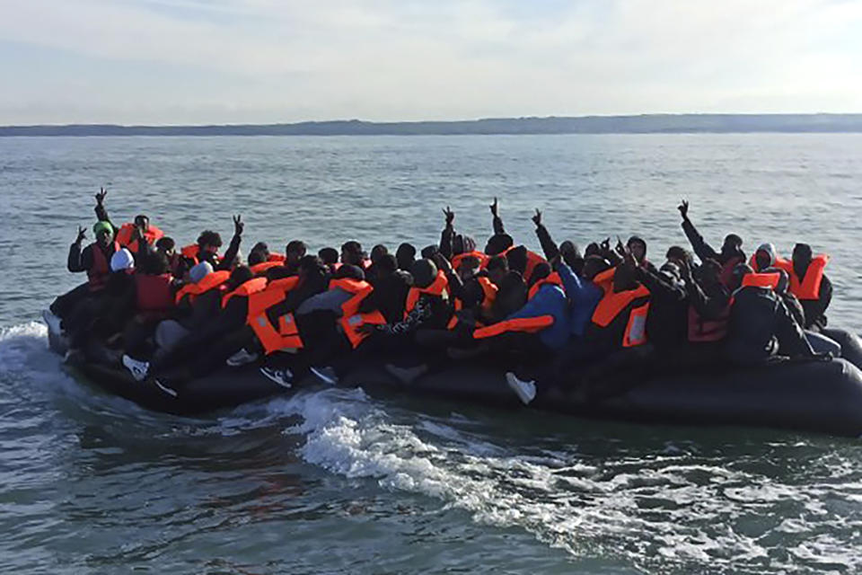 This photo provided by the Prefecture Maritime du Nord et de la Manche shows migrants continuing their journey to Britain off northern France coast, Tuesday, April 23, 2024. Five people, including a child, died while trying to cross the English Channel from France to the U.K., French authorities said Tuesday, just hours after the British government approved a migrant bill to deport some of those who entered the country illegally to Rwanda.(Prefecture Maritime du Nord et de la Manche via AP)