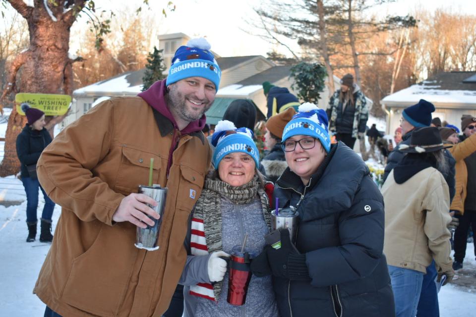 Peter Johnson, left, considers Groundhog Day as the beginning of his birthday celebration. He is joined by Lane Amann, right, and Lolita Amann.