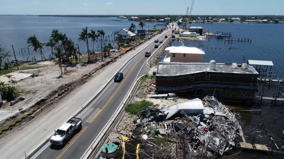 This aerial view of the current progress and ongoing construction work in Matlacha along Pine Island Road was photographed September 13, 2023. Almost a year after Hurricane Ian impacted the area, some businesses are still in the process of recovery.