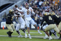 Minnesota quarterback Athan Kaliakmanis (8) throws against Purdue during the first half of an NCAA college football game in West Lafayette, Ind., Saturday, Nov. 11, 2023. (AP Photo/Michael Conroy)