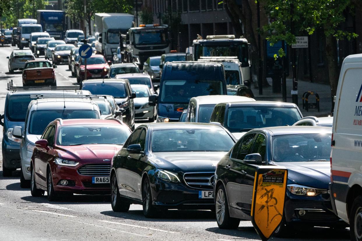 <p>Standstill: Traffic on the A1203 in London</p> (PA)