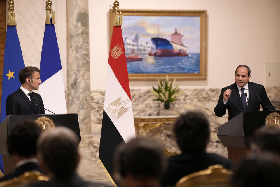 Egyptian President Abdel Fattah el-Sissi, right, and French President Emmanuel Macron hold a joint press conference after their talks in Cairo, Egypt, Wednesday, Oct. 25, 2023. French President Emmanuel Macron was Wednesday on a trip to Jordan and Egypt were he was expected to discuss the prospect of creating a "coalition" to fight against Hamas, one day after he first made the proposal in Israel.(AP Photo/Christophe Ena, Pool)