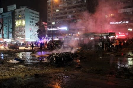 Emergency workers work at the explosion site in Ankara, Turkey March 13, 2016. REUTERS/Tumay Berkin