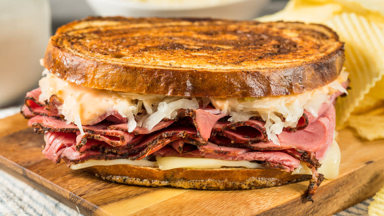 Reuben sandwich on cutting board