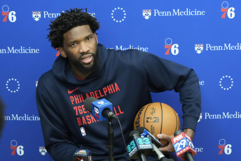 Philadelphia 76ers center Joel Embiid speaks with members of the media at the NBA basketball team's practice facility, Thursday, Feb. 29, 2024, in Camden, N.J. (AP Photo/Matt Rourke)