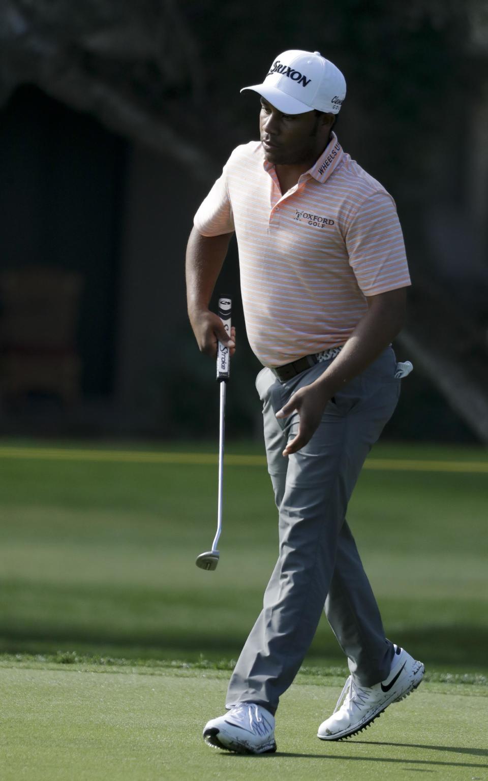 Harold Varner III watches his birdie putt on the 12th green during the first round of the CareerBuilder Challenge at the La Quinta County Club Thursday, Jan. 19, 2017 in La Quinta, Calif. (AP Photo/Chris Carlson)