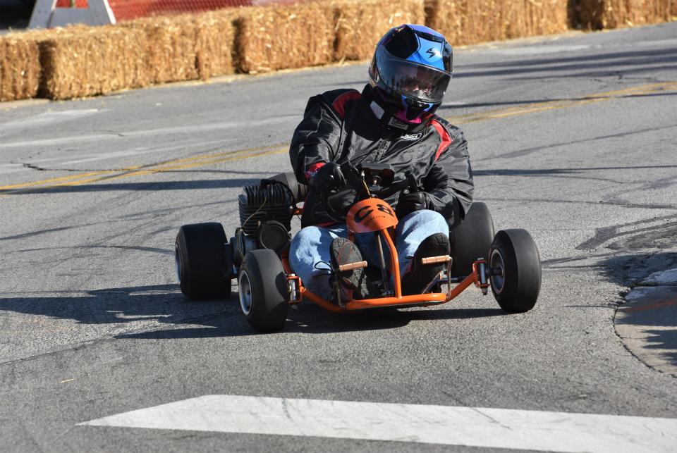 A racer in the annual Clyde Fair Go-Kart Grand Prix rounds a turn on a city street in the 2022 event. The grand prix returns this Sunday.