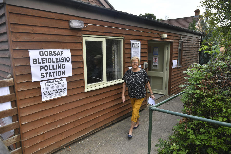 A voter leaves the polling station after voting at Llyswen and Boughrood Community Hall in Llyswen, Wales, Thursday Aug. 1, 2019, after voting in the Brecon and Radnorshire by-election. New British Prime Minister Boris Johnson is facing his first electoral test _ a special election that could see the Conservative government’s working majority in Parliament cut to just one vote. Voters are electing a new lawmaker for the seat of Brecon and Radnorshireafter the Conservative incumbent, Chris Davies, was ousted. (Ben Birchall/PA via AP)
