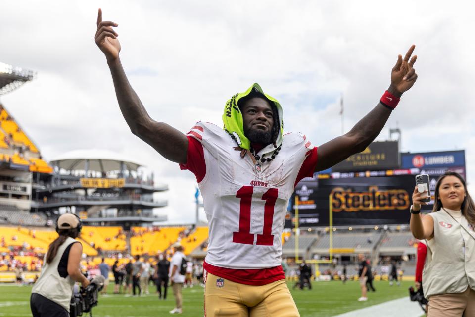 San Francisco 49ers wide receiver Brandon Aiyuk (11) celebrates after an NFL football game, Sunday, Sept. 10, 2023, in Pittsburgh.