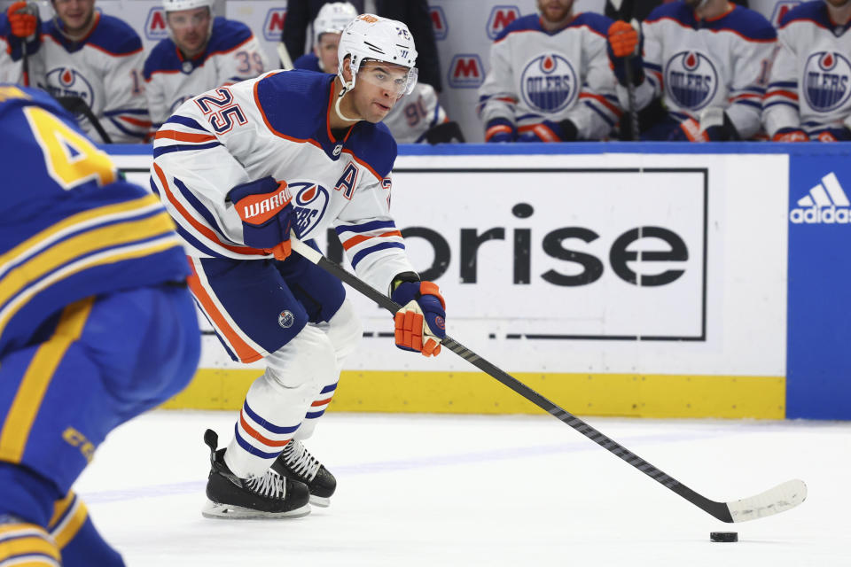 Edmonton Oilers defenseman Darnell Nurse (25) carries the puck past the blue line during the second period of an NHL hockey game against the Buffalo Sabres, Saturday, March 9, 2024, in Buffalo, N.Y. (AP Photo/Jeffrey T. Barnes)