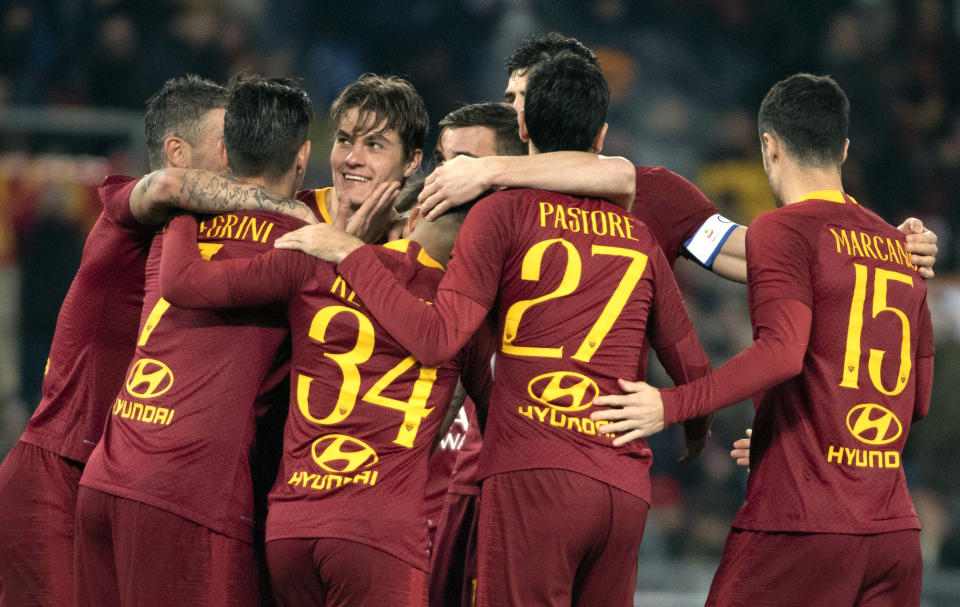 Roma's Patrik Schick, third left, celebrate with teammates after scoring a goal during the Italian Cup soccer match between AS Roma and Virtus Entella at the Olimpico stadium in Rome, Italy, Monday, Jan. 14, 2019. (Maurizio Brambatti/ANSA via AP)