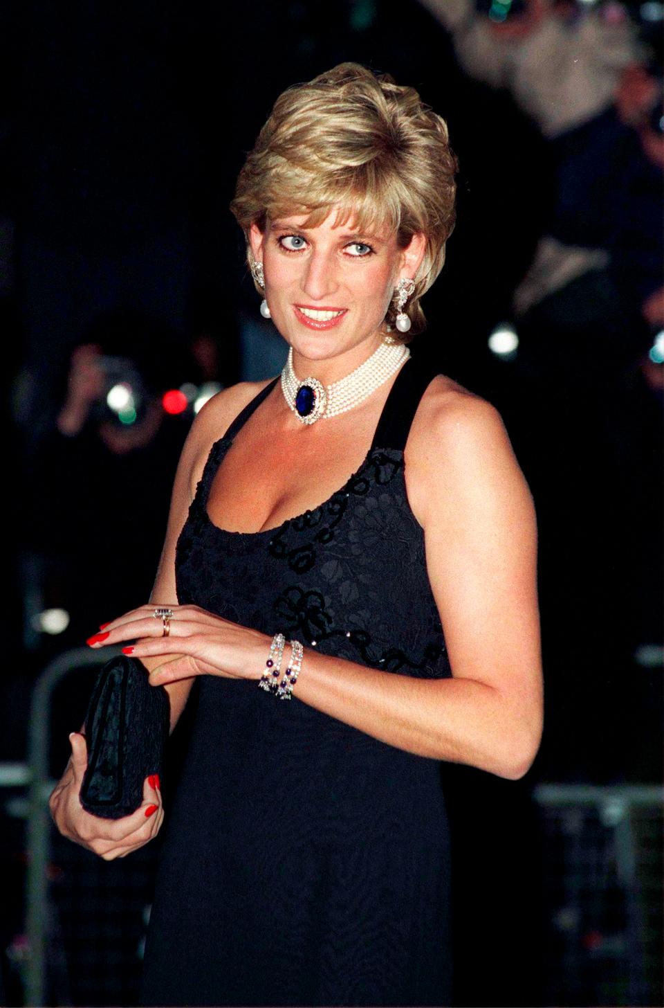 Princess Diana in her signature red nail polish