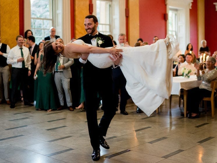 A couple dances at their wedding.