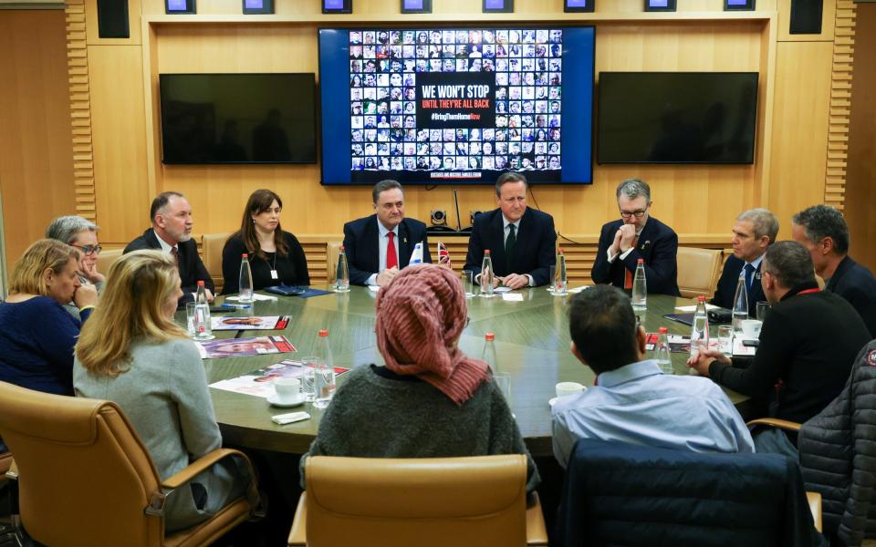 David Cameron and Israel's foreign minister, Israel Katz, meet with families of hostages whilst visiting Jerusalem