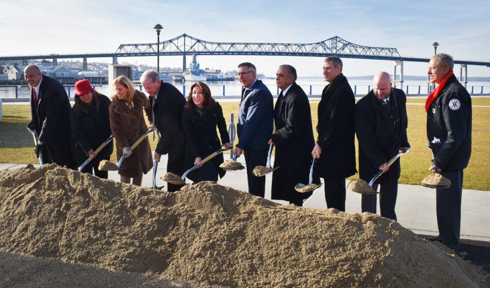 MassDOT Transportation Secretary and CEO Jamey Tesler joins Highway Administrator Jonathan Gulliver, Mayor Paul Coogan and Fall River officials at the Route 79 and Davol Street Corridor Improvement Project groundbreaking at City Pier Wednesday, Dec. 21.