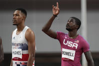 Trayvon Bromell, of the United States, gestures prior to his heat of the men's 100-meters at the 2020 Summer Olympics, Saturday, July 31, 2021, in Tokyo. (AP Photo/David J. Phillip)