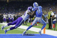 Detroit Lions wide receiver Marvin Jones (11), defended by Minnesota Vikings cornerback Xavier Rhodes (29) catches an 11-yard pass for a touchdown during the first half of an NFL football game, Sunday, Oct. 20, 2019, in Detroit. (AP Photo/Duane Burleson)