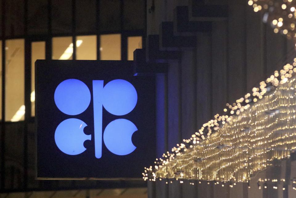 The advertising label of the Organization of the Petroleum Exporting Countries, OPEC, shines at their headquarters in Vienna, Austria, Thursday, Dec. 5, 2019. The countries that make up the OPEC oil-producing cartel are meeting Thursday to decide whether to cut production in order to support the price of fuel and energy around the world. (AP Photo/Ronald Zak)