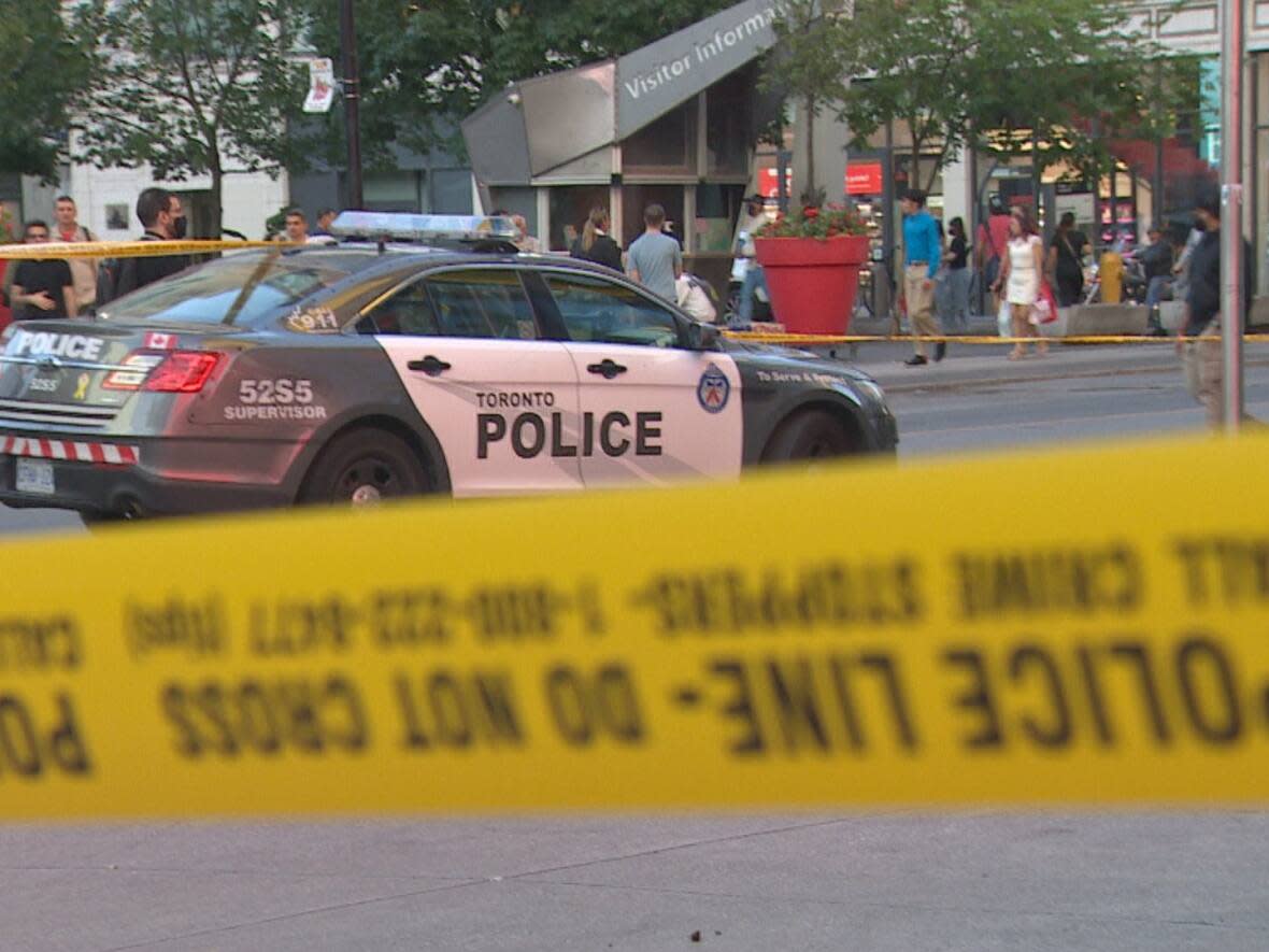 Police arrested a male suspect Tuesday after a man was stabbed multiple times in downtown Toronto. (Michael Aitkens / CBC News - image credit)