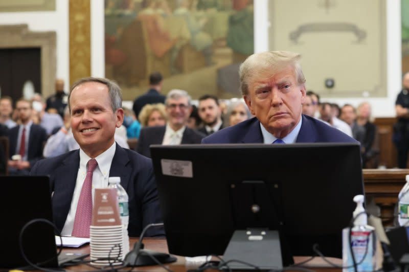 Former President Donald Trump appears in State Supreme Court in New York for the opening of his civil fraud trial on Monday. Photo by Brendan McDermid/UPI